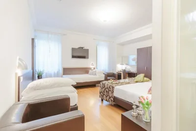 Четырёхместный номер — Hotel Hambros - Il Parco in Villa Banchieri